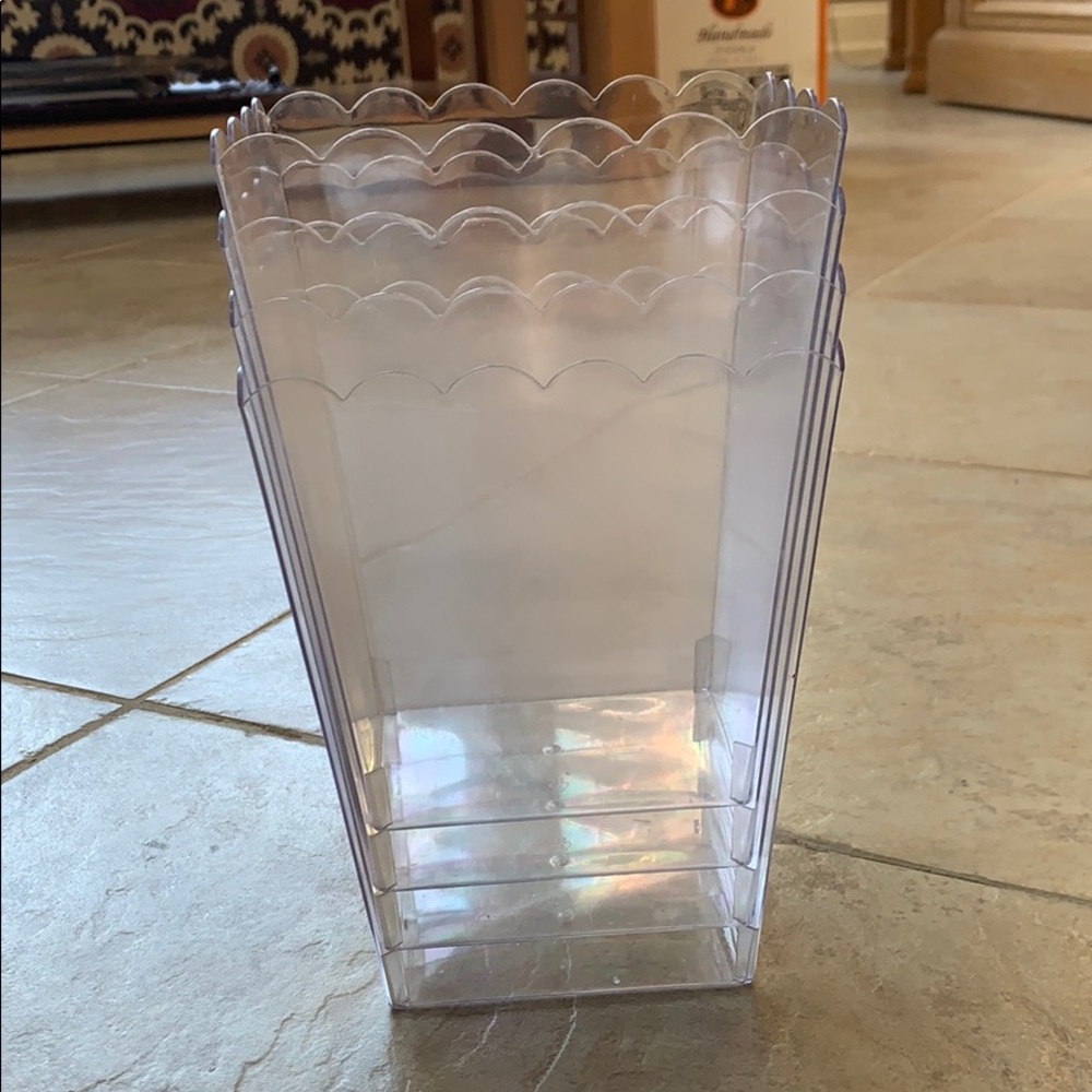 Set of 4 clear plastic vases